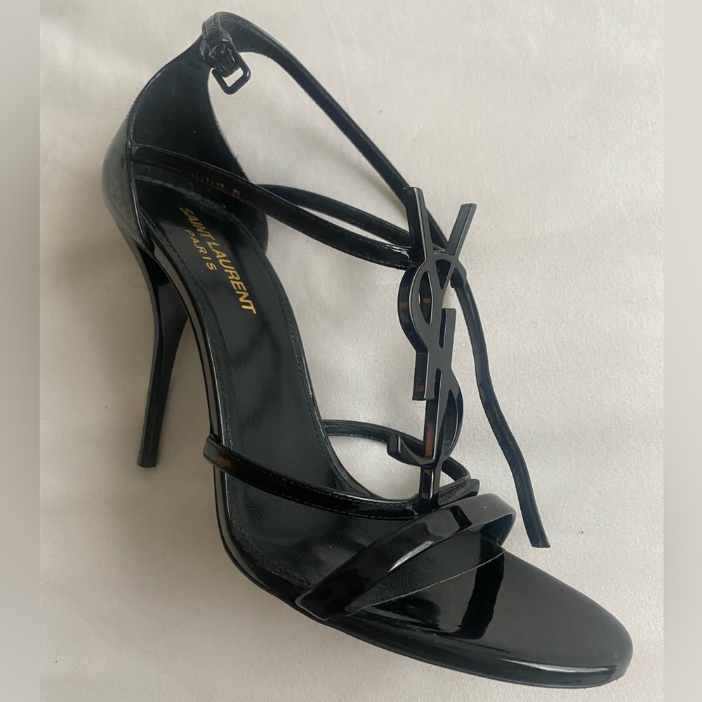 These heels have been worn all of twice! Includes original box and bag..